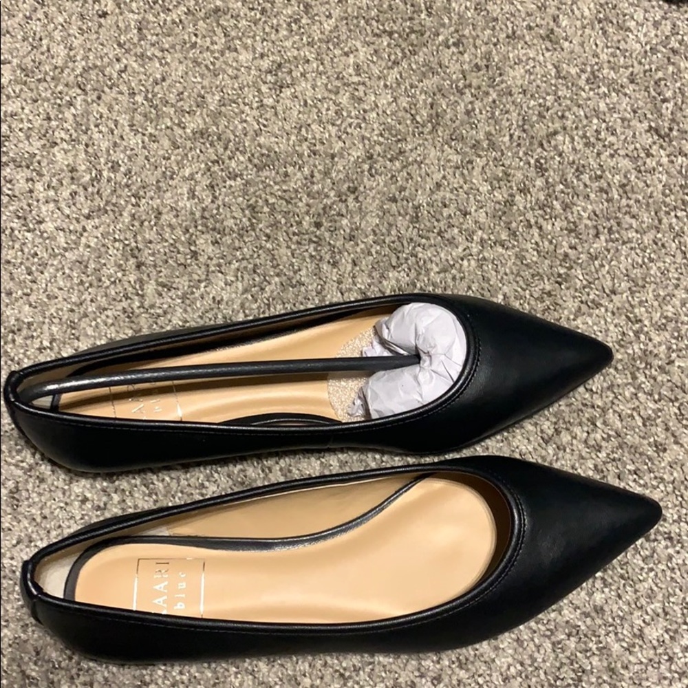 Never worn Kaari Blue flats